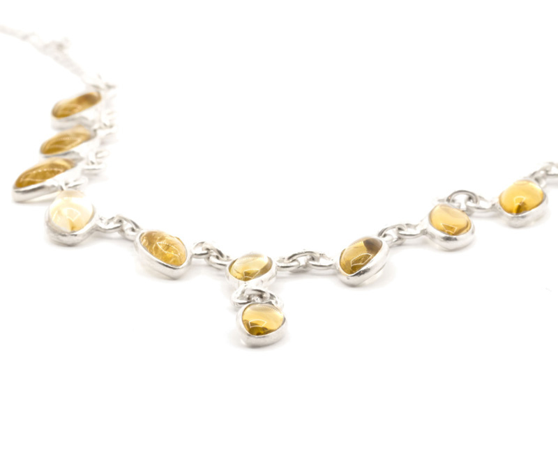 Vogue Crafts & Designs Pvt. Ltd. manufactures Golden Yellow Stone Silver Necklace at wholesale price.