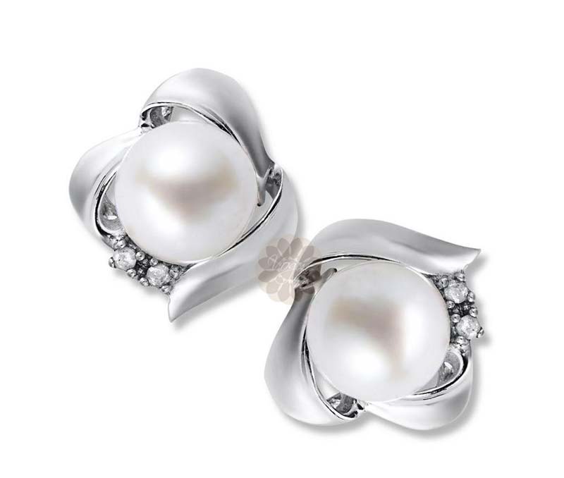 Vogue Crafts & Designs Pvt. Ltd. manufactures Pearl Silver Stud Earrings at wholesale price.