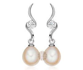 Vogue Crafts and Designs Pvt. Ltd. manufactures Teardrop Pearl Silver Earrings at wholesale price.
