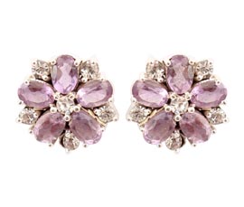Vogue Crafts and Designs Pvt. Ltd. manufactures Floral Silver Stud Earrings at wholesale price.