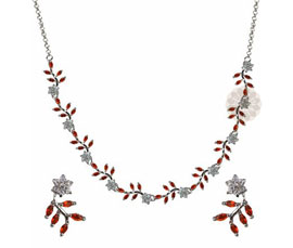 Vogue Crafts and Designs Pvt. Ltd. manufactures Floral Silver Necklace with Earrings at wholesale price.